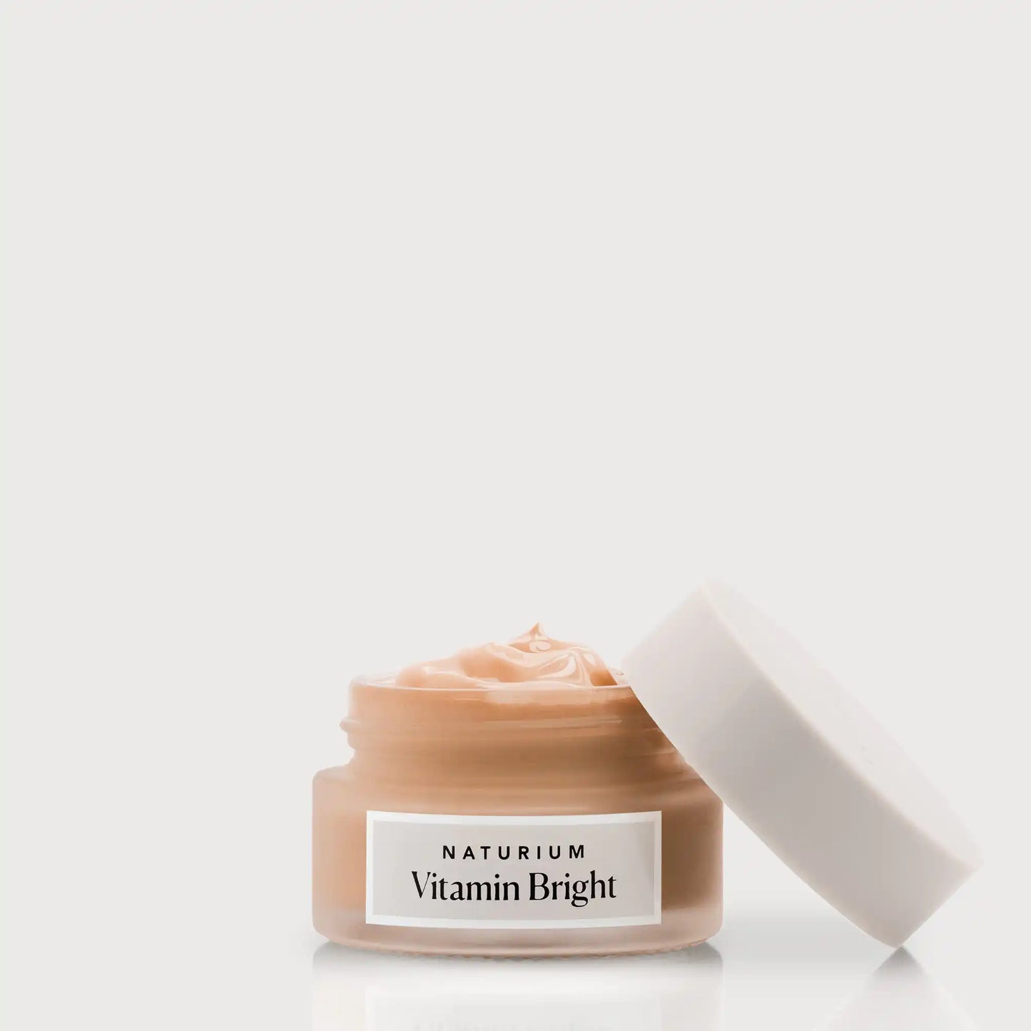 vitamin-bright-illuminating-eye-cream-u1 NATR-VitaminBright_DEEP_Primary_front_openjar_bone.webp