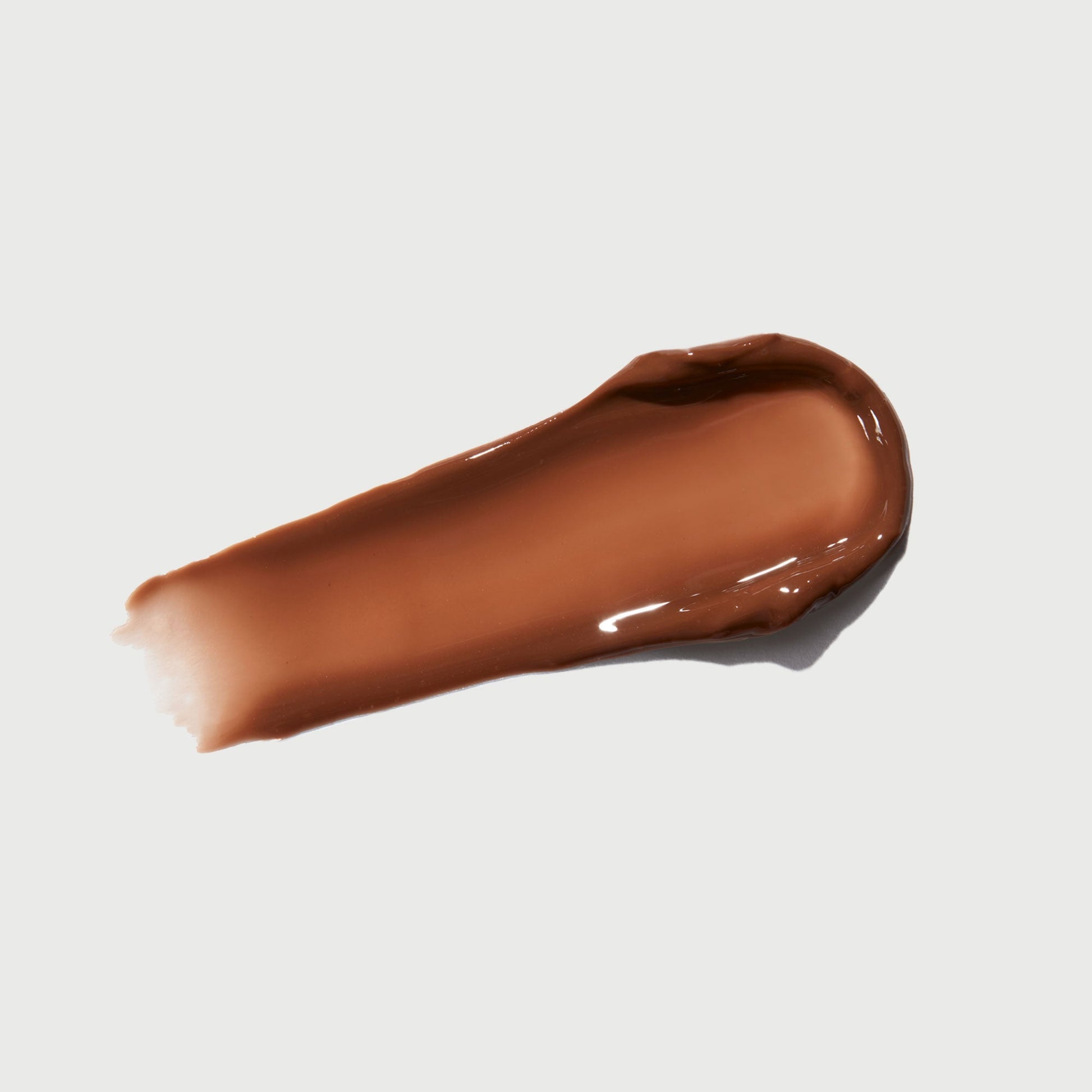 phyto-glow-lip-balm-spice-i9 NATR-60113-Swatch-Phyto-Glow-Spice-bonebkgd.jpg