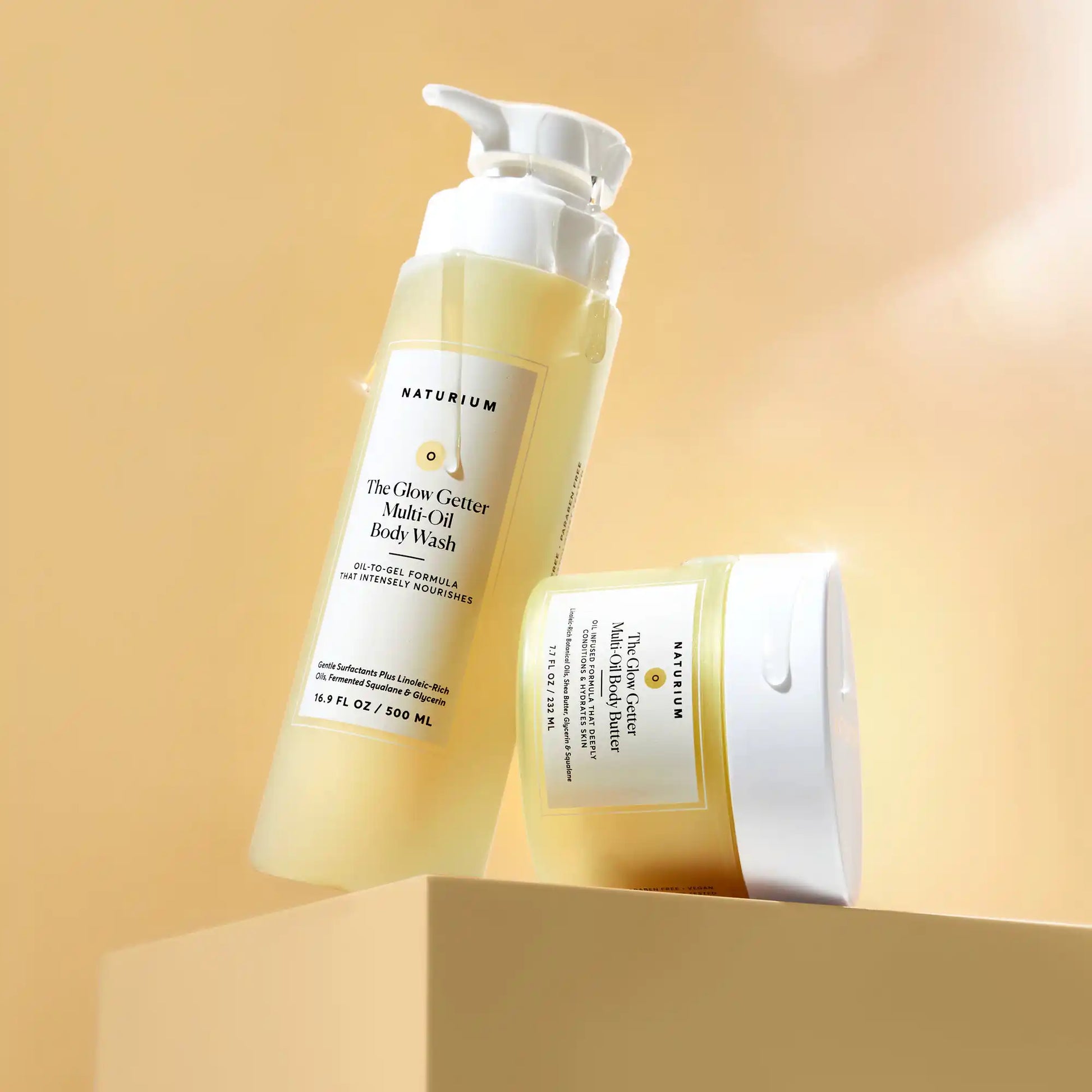 the-glow-all-out-body-bundle-e2 gg-bodybutter_1464-crop_revcolor_FL.webp